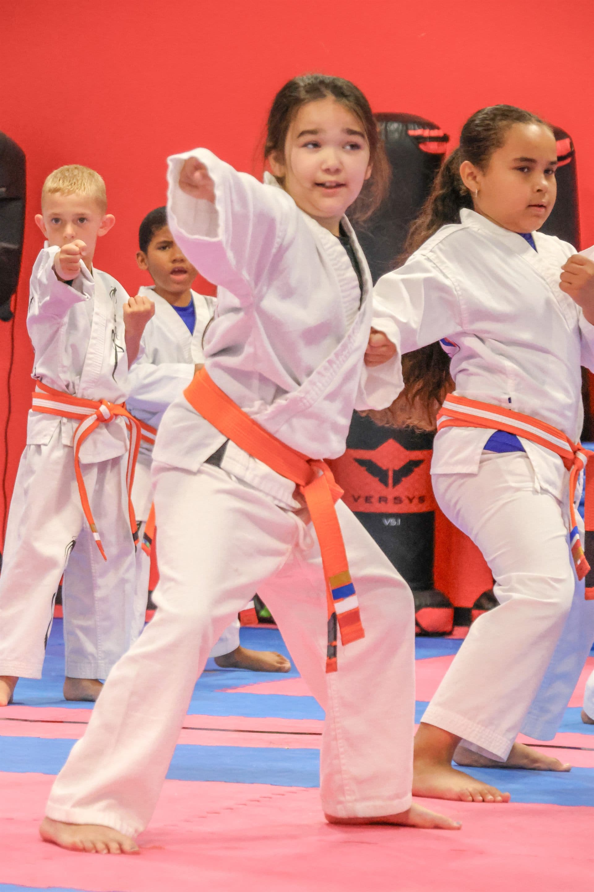 Kids punching together in class at Prospect Martial Arts